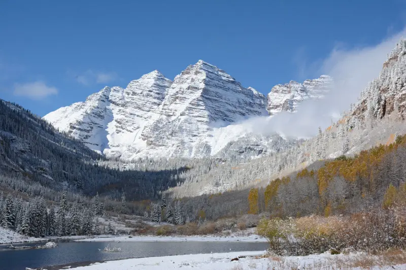 Snow covered Maroon Bells peaks near Aspen